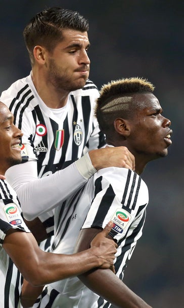 Last-gasp goal from Cuadrado earns Juventus 2-1 win in derby